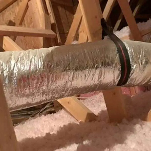 Air Duct and Wooden Beams in Attic