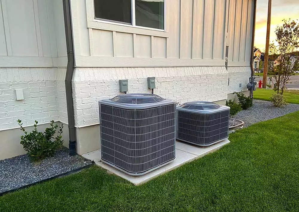 AC units outside the beautiful exterior of a home